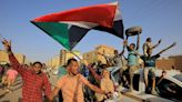 Sudan transition deal delayed, protesters march against talks