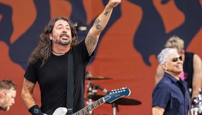 Jazz Fest rocked to a close Friday with the Foo Fighters, who saluted Taylor Hawkins