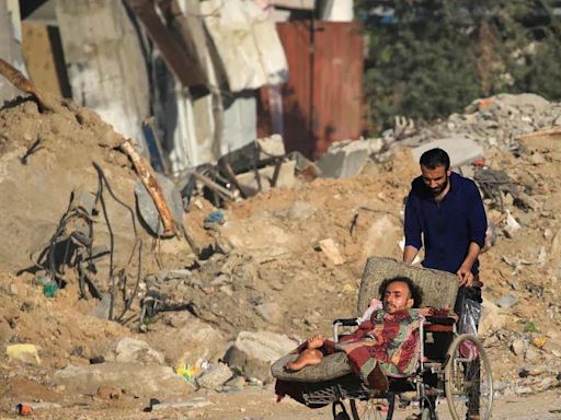 Israel bombs Hamas hideout in Gaza refugee camp as war enters ninth month