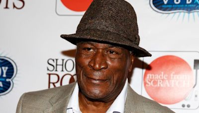 John Amos’ daughter says she learned of his death through the media