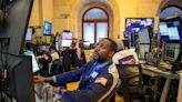 US stocks end mixed as Fed officials sound off on inflation fight and path of future rate hikes