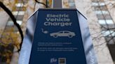 Factbox - Consolidation powers up in EV home charging sector