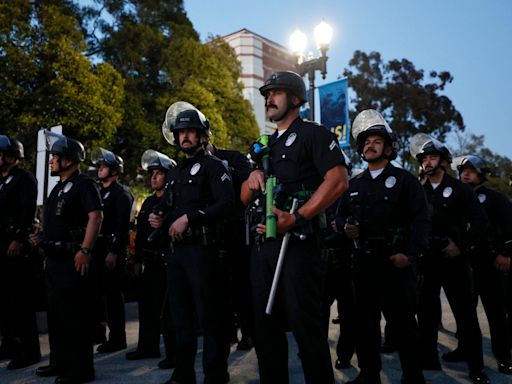 Police in riot gear mass on UCLA campus as 300 pro-Palestine protesters arrested at Columbia, Cuny - live