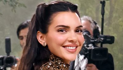 Kendall Jenner goes braless under see-through red dress for Vogue France