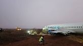 Boeing jet skids off runway, injuring at least 10 as aircraft 'caught fire' during takeoff