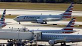 Blown landing-gear tire causes a flight delay at Tampa International Airport; no injuries reported