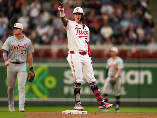 Miranda, Twins thump Tigers 12-3 before rain halts game early