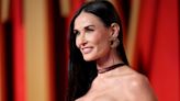 The Neckline of Demi Moore's White Bodycon Dress Doubled as a Statement Necklace