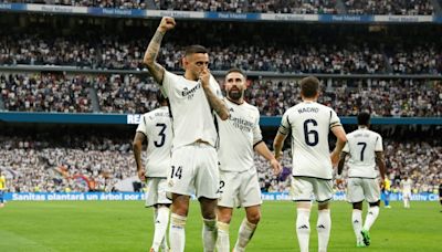 Real Madrid claim 36th Spanish title after Girona stun Barca