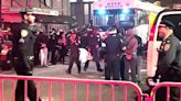 Protesters Chant 'Shame on You' as NYPD Buses Depart