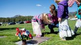 PHOTOS: Volunteers help place flags at Air Force Academy Cemetery ahead of Memorial Day