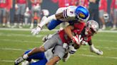 Bean throws for 6 TDs, Kansas overcomes flags to beat UNLV 49-36 in Guaranteed Rate Bowl