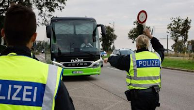 Germany begins conducting checks at all its land borders