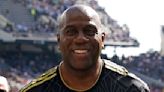 AP source: Magic Johnson joins Harris' bid for Commanders