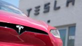 Tesla’s stock leaps on reports of Chinese approval for the company’s driving software