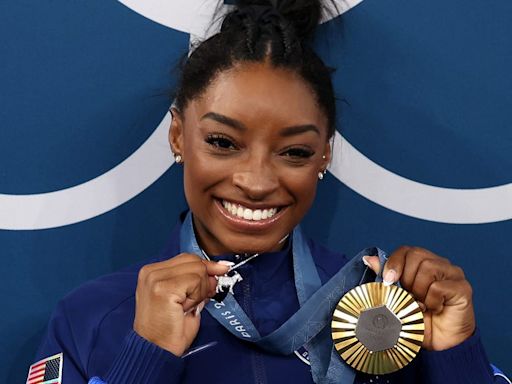 The Meaning Behind Simone Biles’s Sparkly Goat Necklace Is Iconic