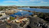 Body recovered from Columbia Point Marina. A fisherman saw headlights under the water