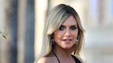 Heidi Klum Sunbathes in Shimmery Itty-Bitty Crochet Bikini