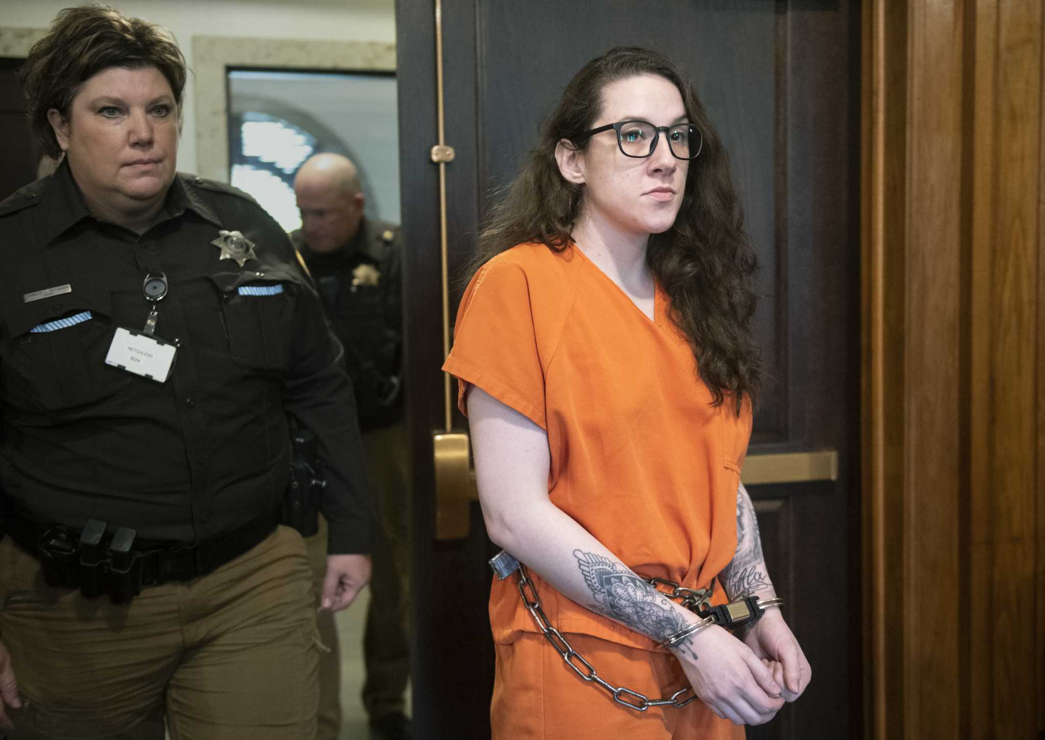 Court upholds a Nebraska woman's murder conviction, life sentence in dismemberment killing