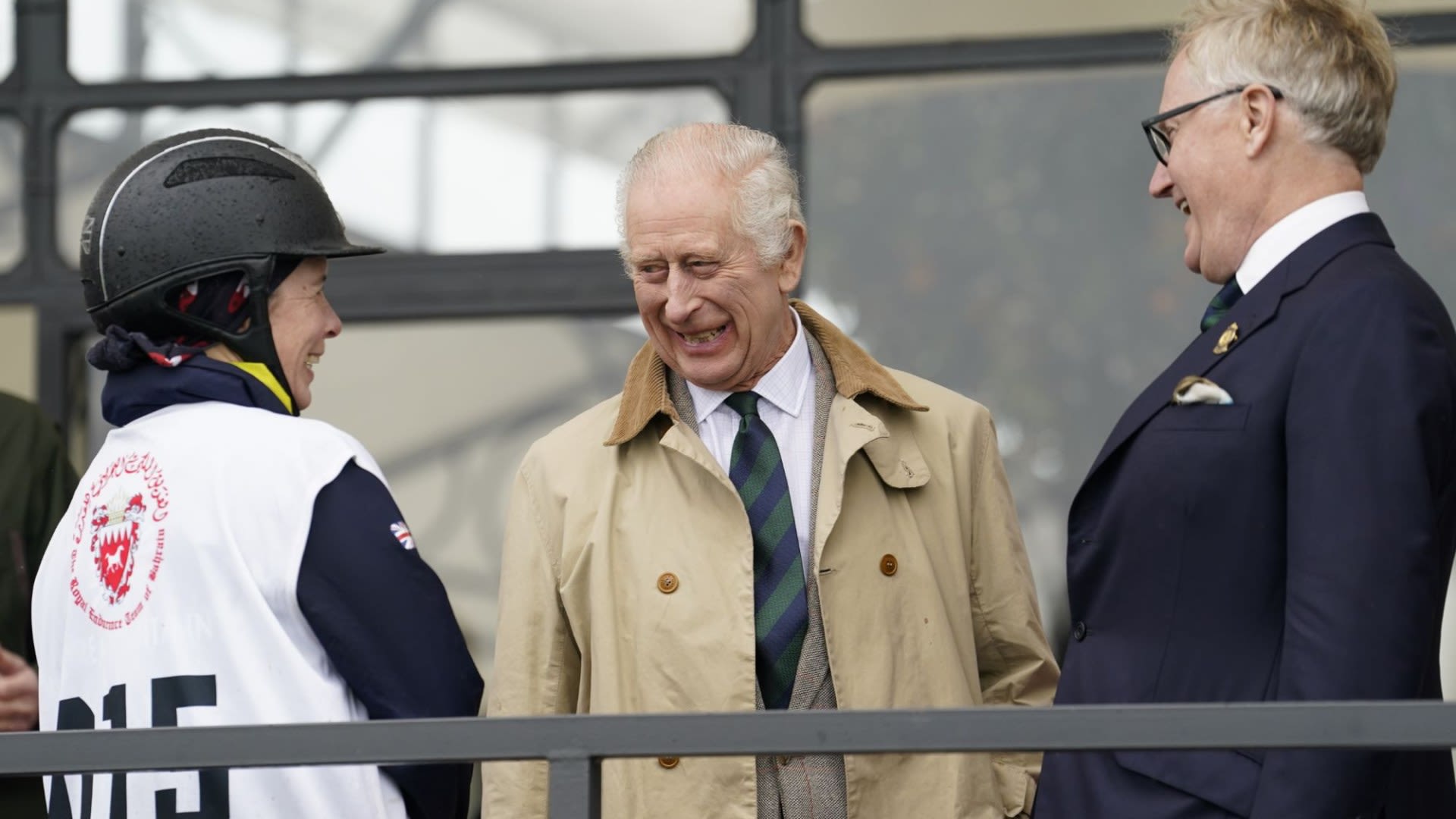 Charles beams at rain-soaked horse show after returning to public duties