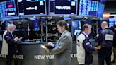 Wall Street mixed as it digests macro 'tsunami'