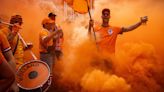 Thousands of Dutch fans squeeze into the streets of Dortmund