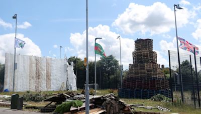 Protective covers put up at east Belfast bonfire sites to protect public spaces from fire and heat damage