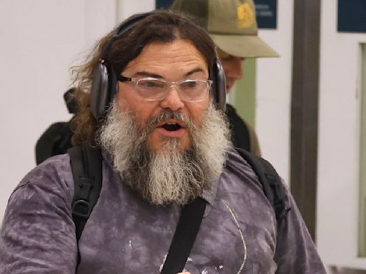 Jack Black arrives in Sydney wearing bizarre outfit