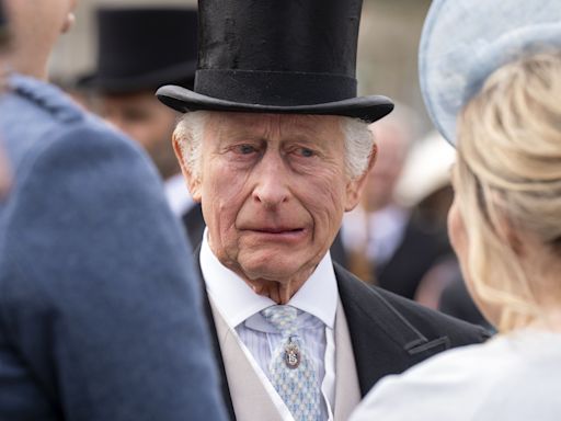 Charles shares memories of school cricket match as he hosts garden party