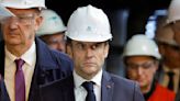 Macron vows to build back factories, boost France's economy shaken by pension protests