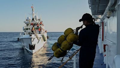 China Exploring Disputed Shoal for Reclamation, Philippines Says