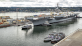 USS Theodore Roosevelt undocks from dry dock at Puget Sound Naval Shipyard