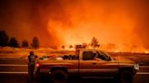 Evacuations, destruction as California's largest fire of year rages