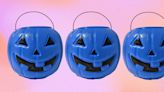 What do blue candy buckets on Halloween mean, and why are they controversial?