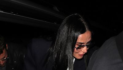 Demi Moore cuts a trendy figure in camel combat trousers