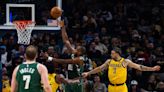 Bucks use record scoring first half, 41 points from Giannis Antetokounmpo to hold off Pacers 141-131