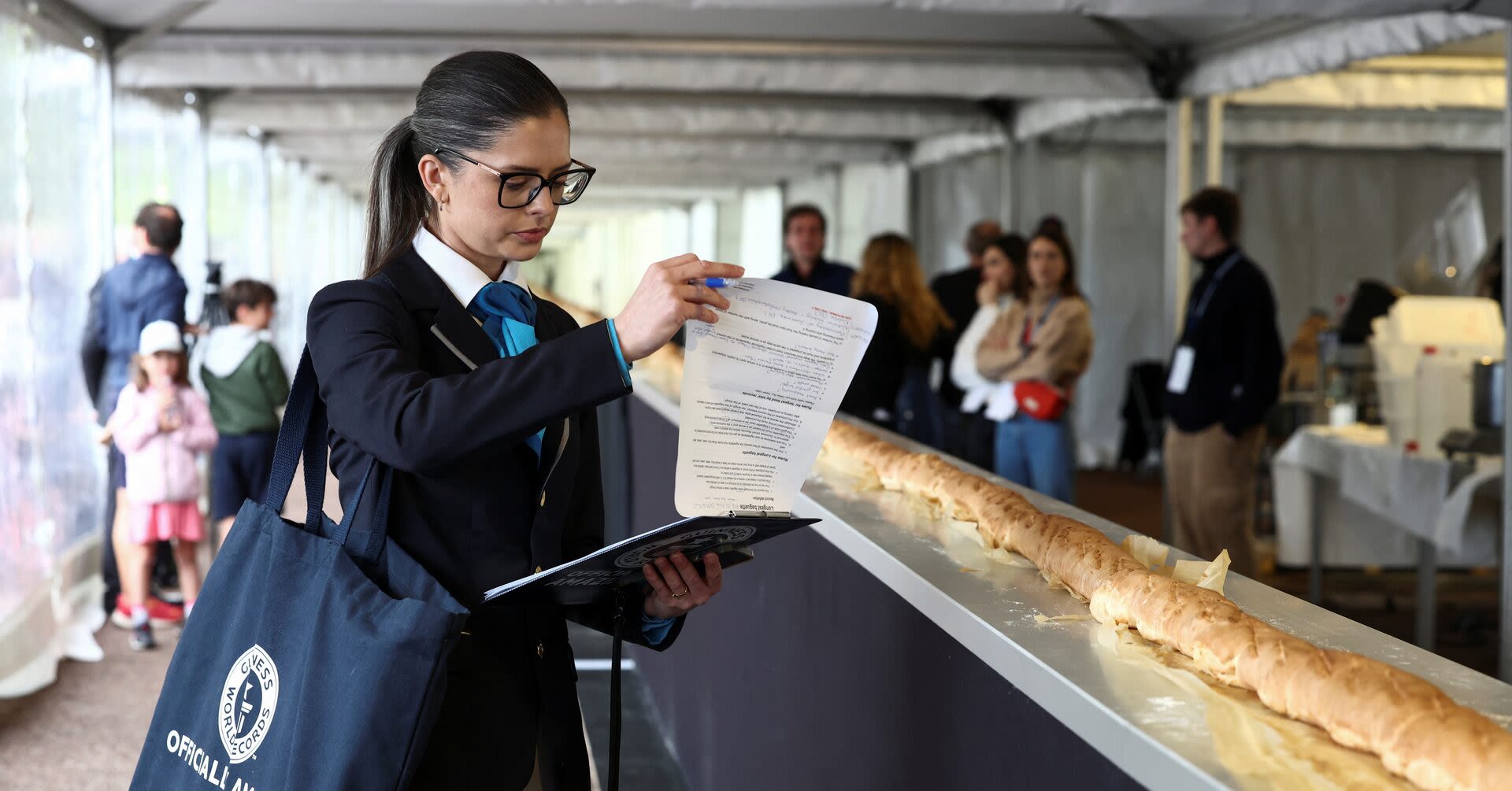 French bakers make world's longest baguette, beating Italy