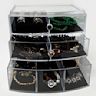 Made of clear acrylic material Sleek and modern design Allows for easy viewing of jewelry Often feature multiple compartments for organizing jewelry Available in various sizes and designs