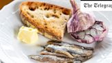 Smoked anchovies on toast with baked new-season garlic recipe