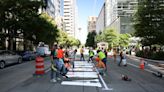 Environmental groups target Amazon’s climate efforts with Prime Day protest at Seattle HQ