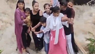 Video shows tragic moment an Indian family is swept away by floodwaters