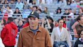 Ashton Kutcher and Mila Kunis pack on the PDA at Morgan Wallen gig