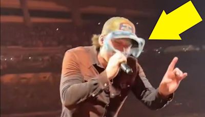 Morgan Wallen is hit in the face by THONG underwear during concert