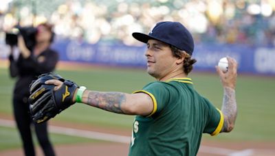 Green Day’s Billie Joe Armstrong spray-paints over A’s logo at Toronto Blue Jays’ stadium