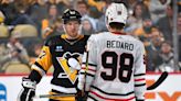 Crosby shows flashes of typical brilliance but defense wanes in loss to Bedard's Blackhawks