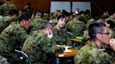 Exclusive-Japan’s military needs more women. But it’s still failing on harassment