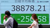 Stock market today: Asian shares are mostly lower ahead of Fed decision on interest rates