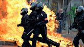 Violent protests and strikes across France amid anger over Macron pension reforms