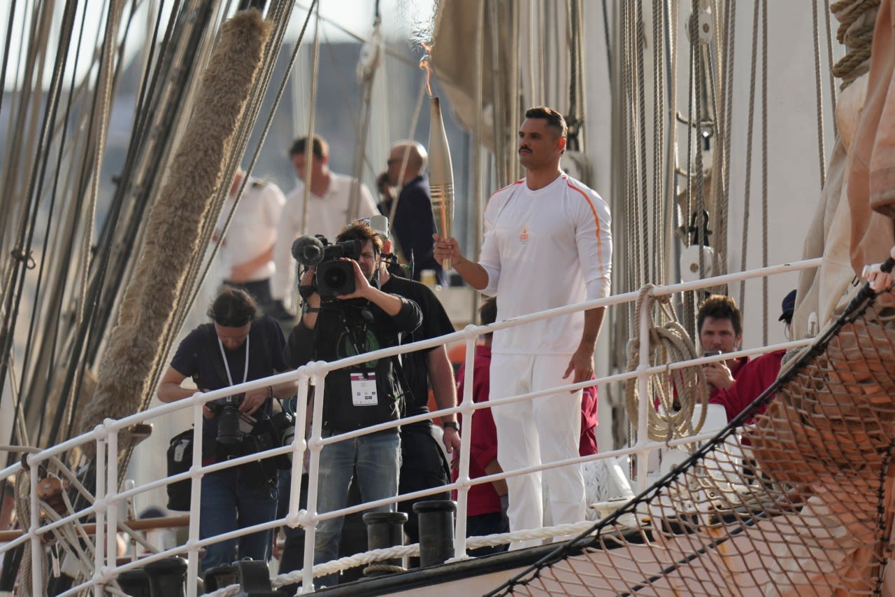 Torchbearers in Marseille kick off the Olympic flame’s journey across the country