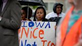 Iowa law lets police arrest migrants. The federal government and civil rights groups are suing